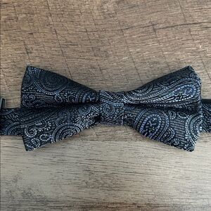 John Bartlett statements bow tie